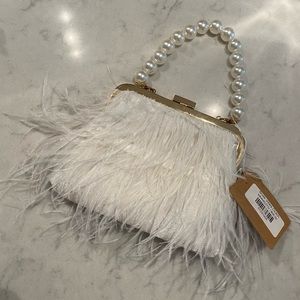 White fringe clutch (sold out online)